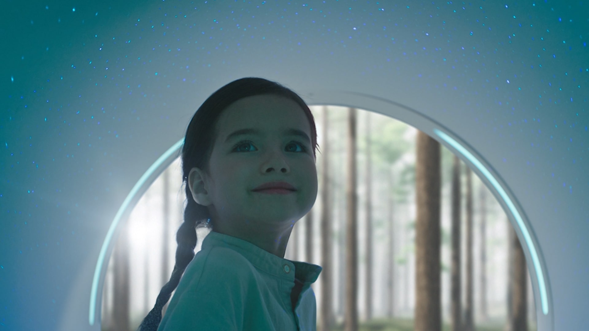 a girl looking at the starry sky environment inside uMR Omega™